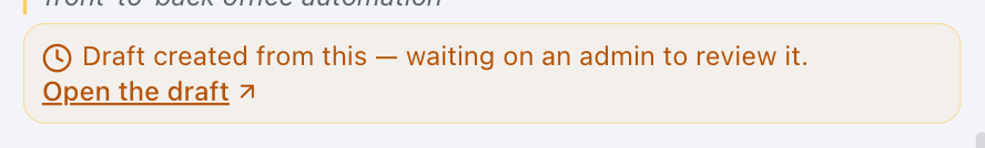 An amber notice reading "Draft created from this — waiting on an admin to review it" with a link to open the draft.
